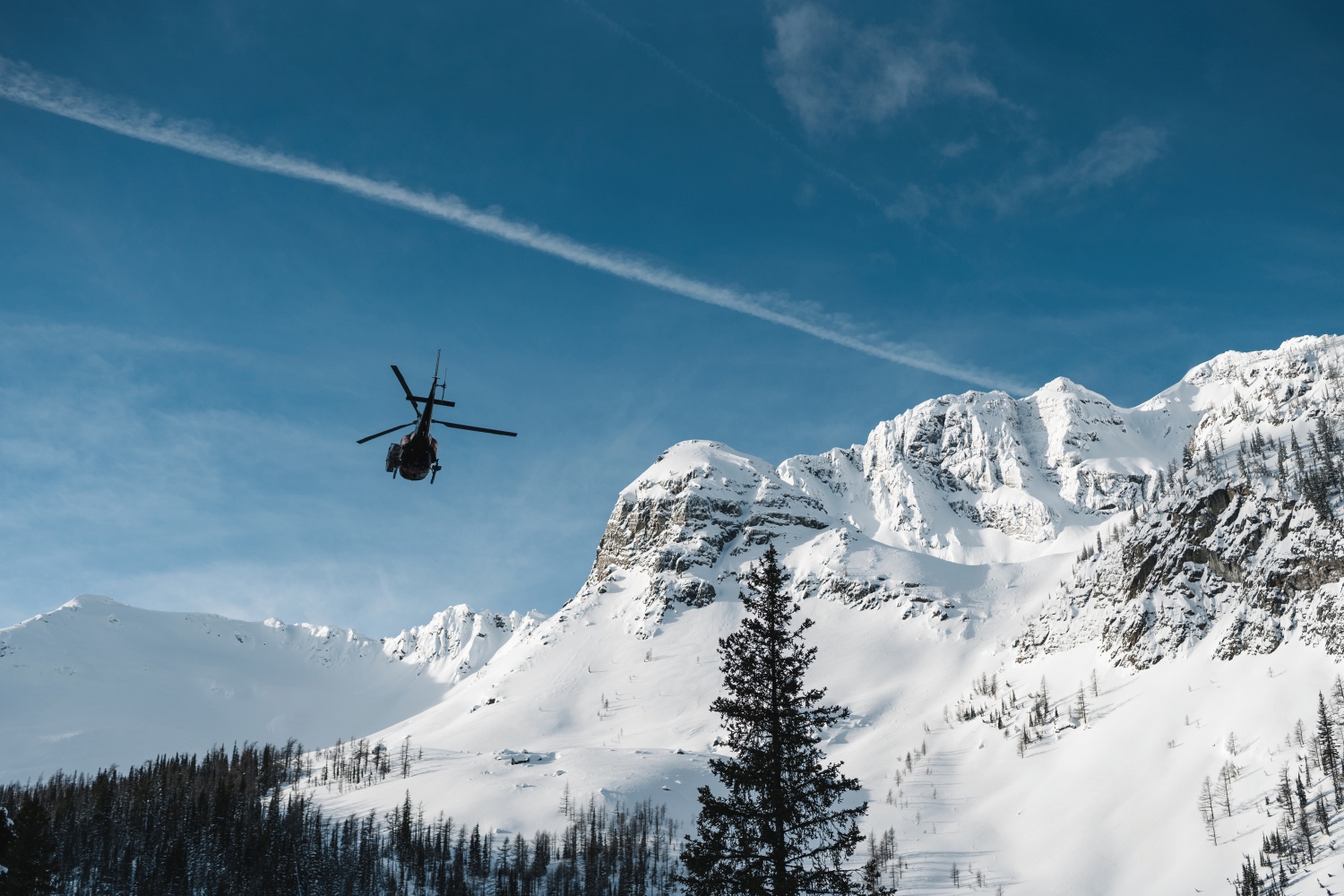 helicopter flying through snow scene