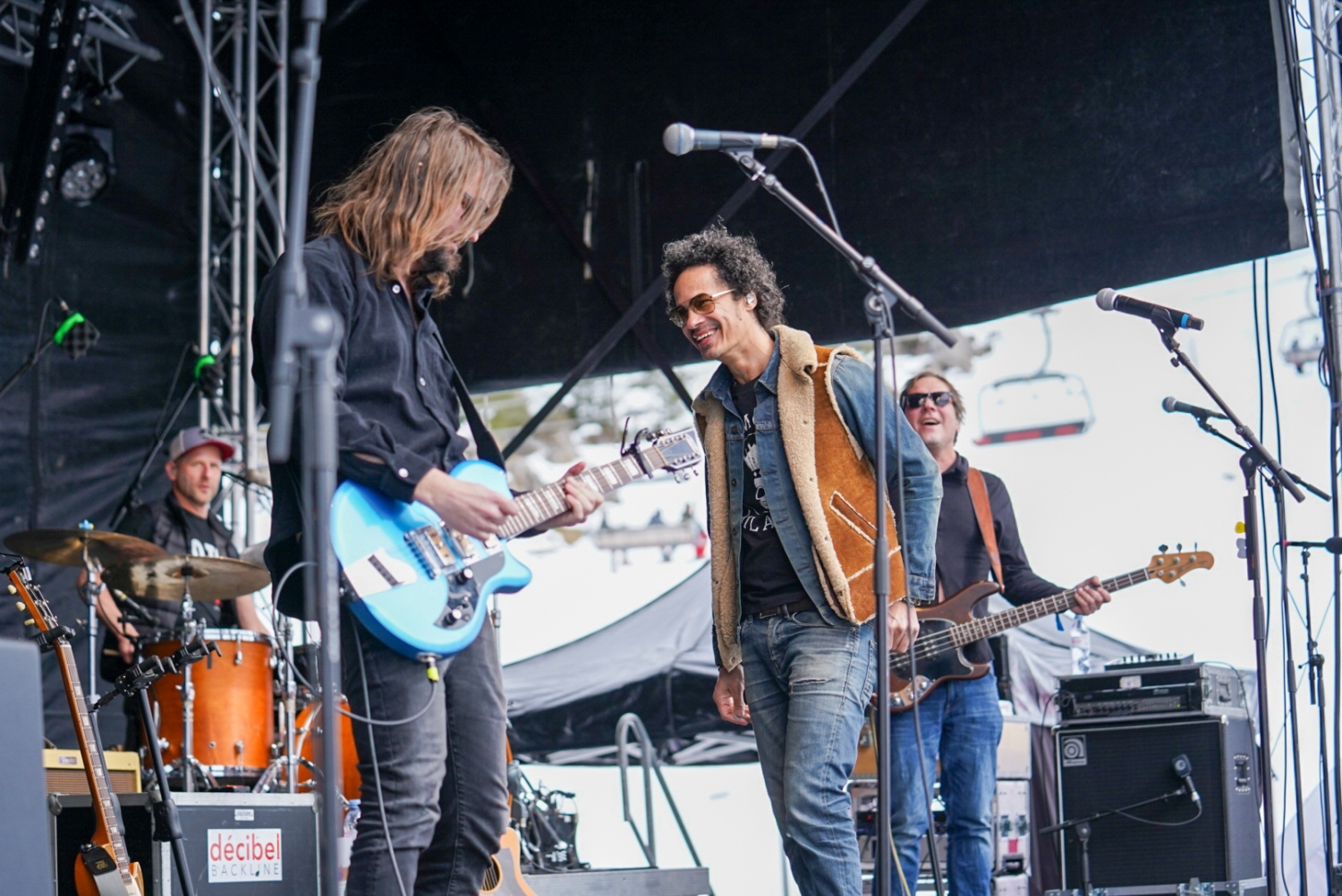 Band smiling and playing on stage_Rock The Pistes Festival Review