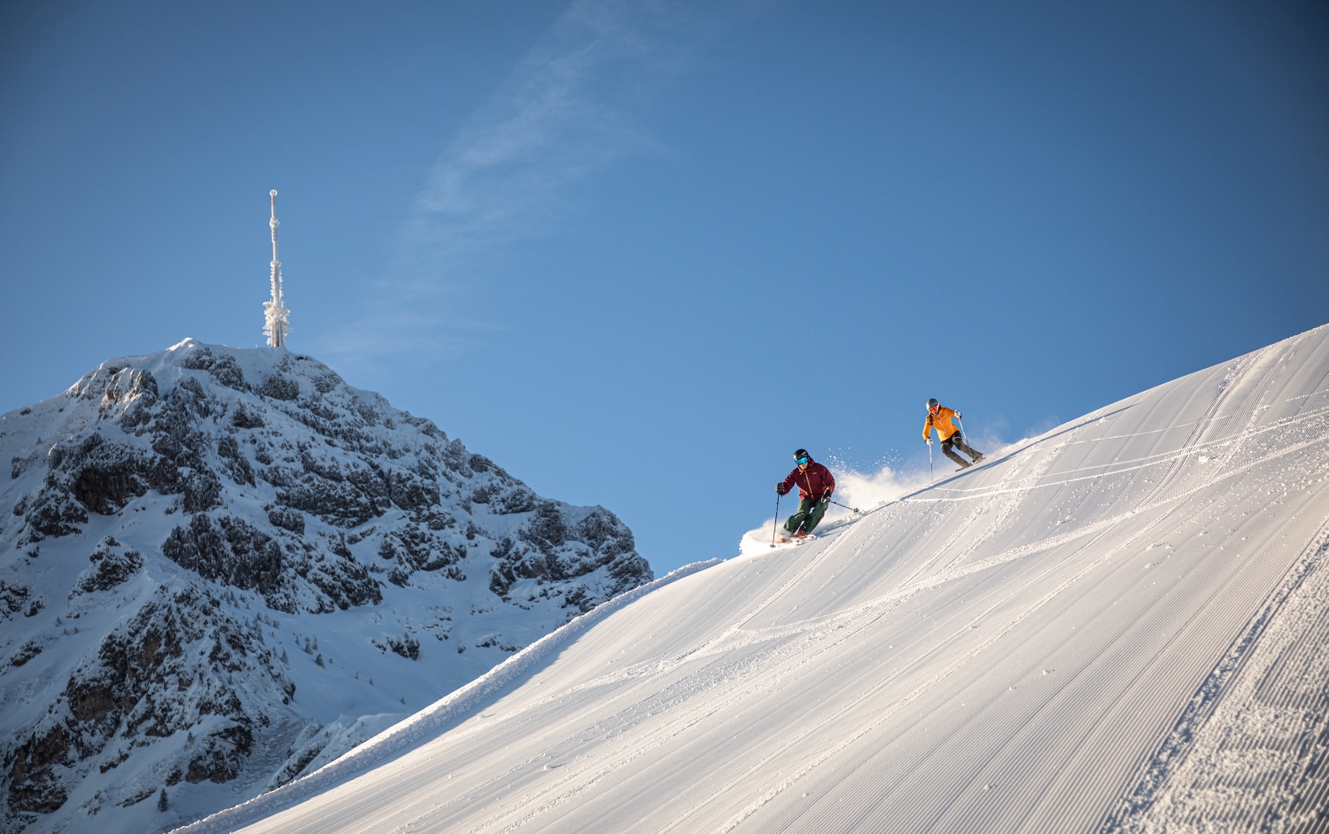 Fun on the slopes of the Harschbichl with a view of the Kitzbüheler Horn in St. Johann in Tirol