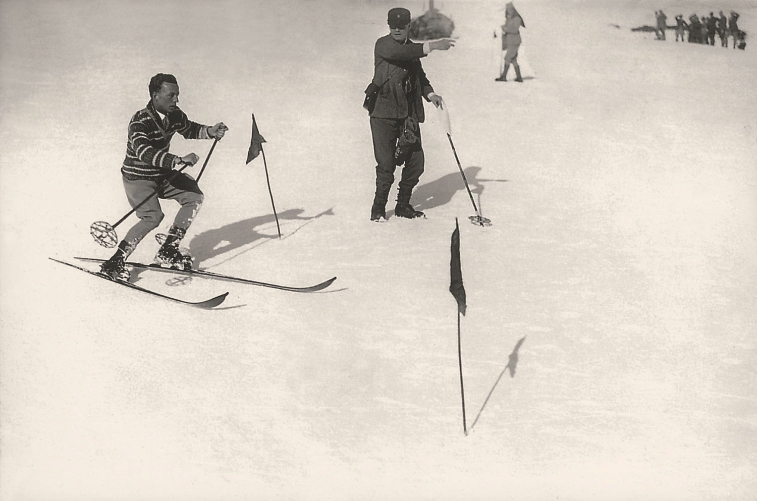Old photo of skier doing slalom skiing in Murren