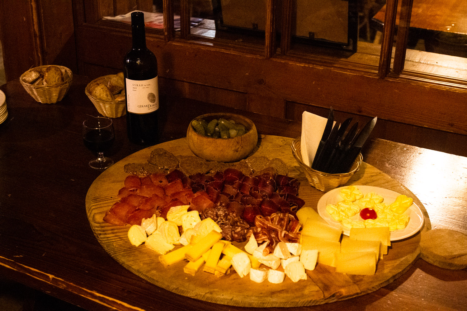 Cheese and meat platter with wine