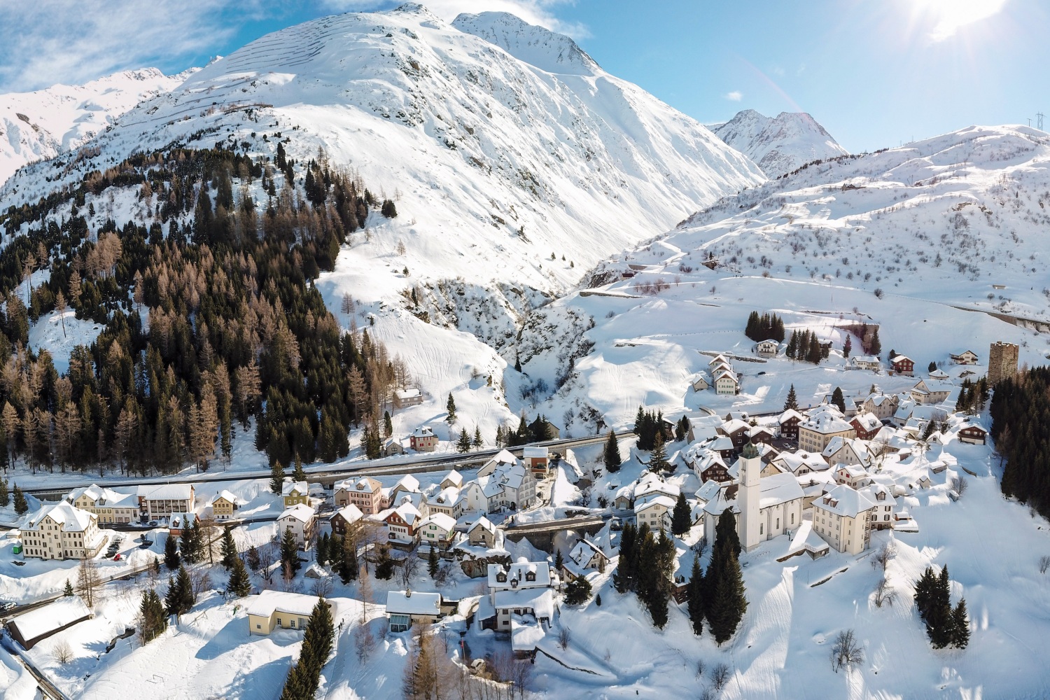 Hospental town covered with snow next to snowy mountain Andermatt CREDIT Valentin Luthiger