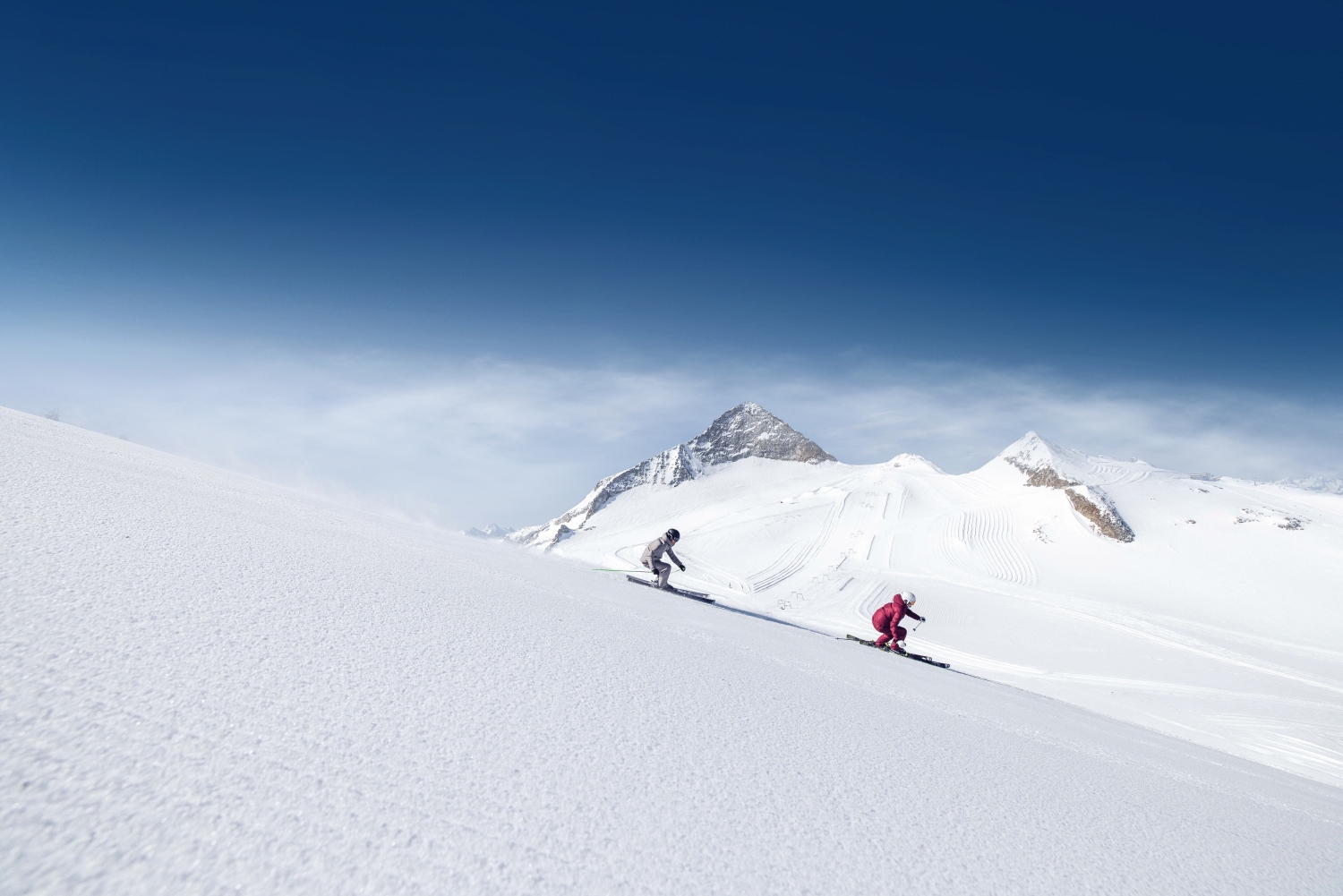 Skiers riding down mountain - Zillertal, Austria