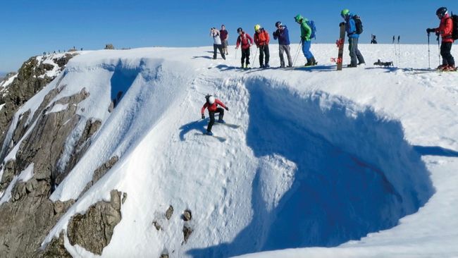 Gavin Carruthers dropping in to Tower Gully on Ben Nevis Photo by Blair Aitken.jpg