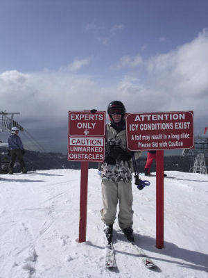 Colin contemplates the warning signs at the top of Gun Barrel Run, Heavenly, Lake Tahoe Gun Barrel Run Tahoe