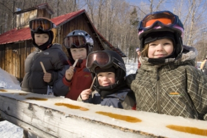 Children enjoying homemade taffy, Mont-Sainte-Anne, Canada Homemade_taffy_Mont-Sainte-Anne