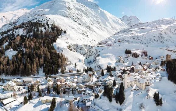 Hospental town covered with snow next to snowy mountain Andermatt CREDIT Valentin Luthiger