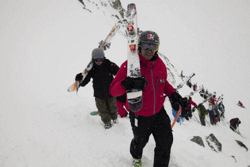 Extremely Canadian guide Peter Smart leads a group of skiers on the hike up Spanky’s Ladder, Whistler, Canada Ski guide Whistler Canada