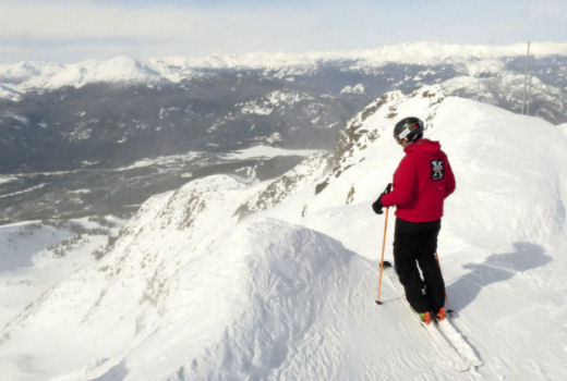 Peter peering over the edge of Extreme Couloir, Whistler, Canada Whistler Extreme Canada