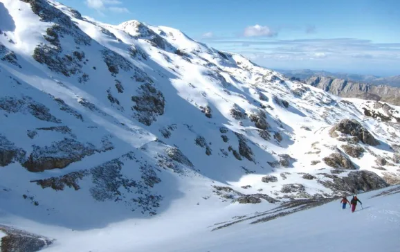 needing to use crampons on icy slope