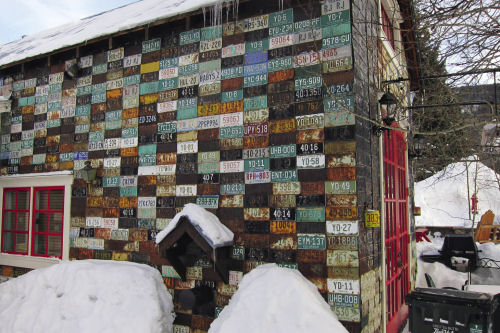 US car numberplates clad a wooden house in Crested Butte, Colorado Crested Butte Colorado US car numberplates