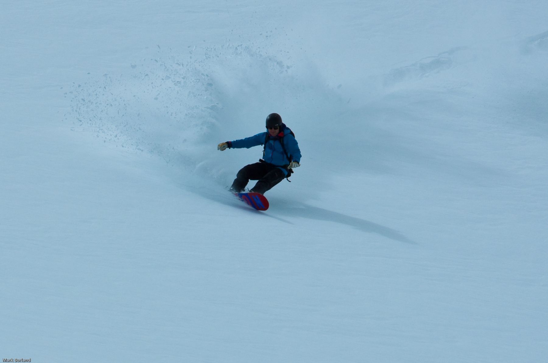 pete coombs making a healside powder turn by mark borland