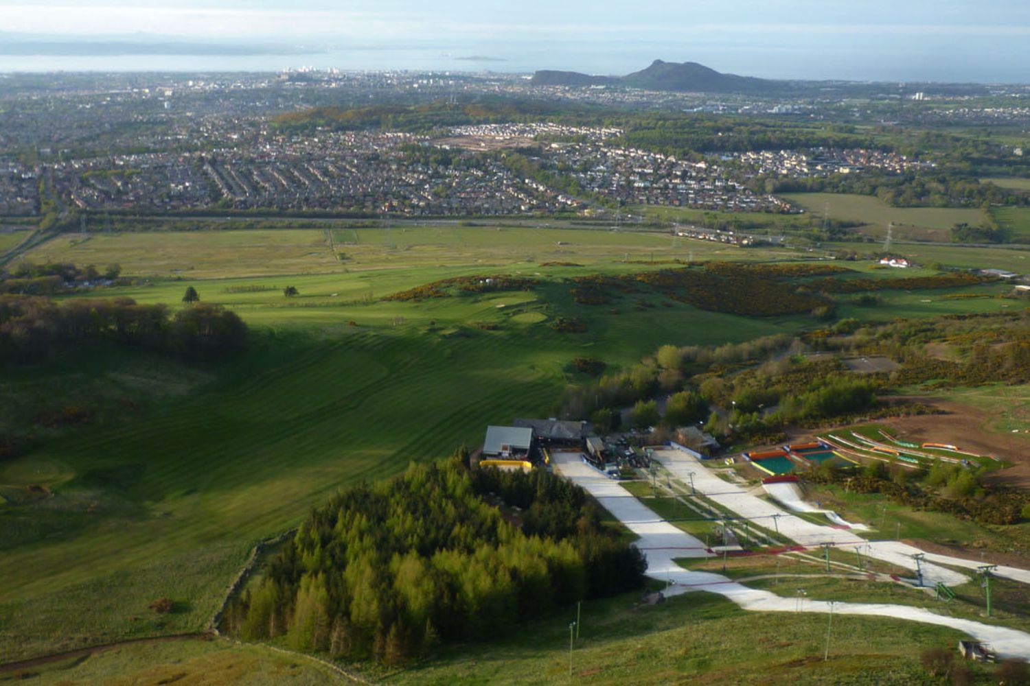 Views across dry ski slopes and surrounding area, Midlothian Snowsports Centre