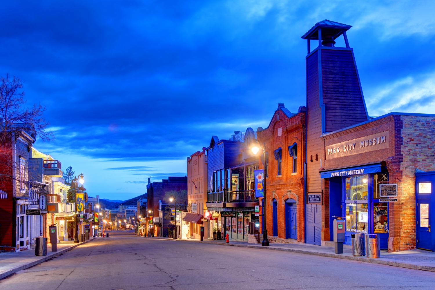 Main Street, Park City at dusk and empty of cars and people under a cloudy sky