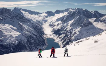 Skiers looking out over mountain landscape Skiing Zillertal Austria CREDIT Tom Klocker