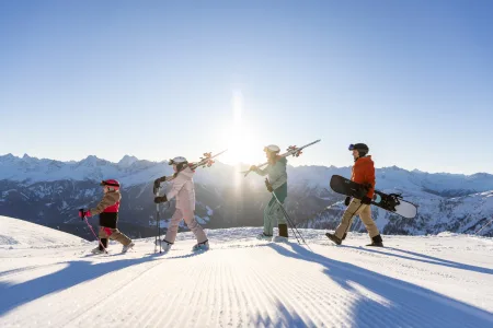 Family skiing in the early morning CSerfaus Fiss Ladis Marketing GmbH photographer Daniel Zangerl