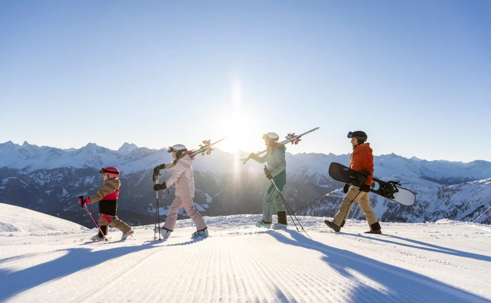 Family skiing in the early morning CSerfaus Fiss Ladis Marketing GmbH photographer Daniel Zangerl