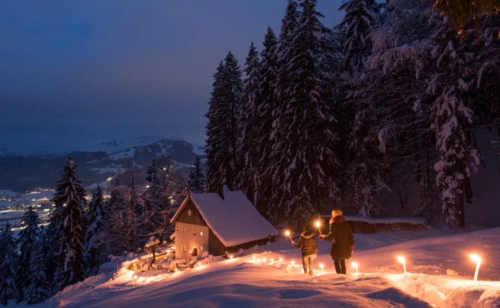 Torchlit winter walk to the Maria Blut hermitage in St. Johann in Tirol CFranz Gerdl