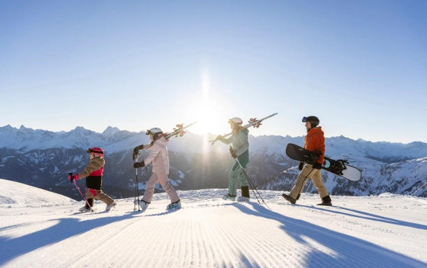 Family skiing in the early morning CSerfaus Fiss Ladis Marketing GmbH photographer Daniel Zangerl