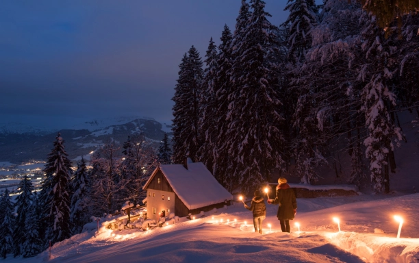 Torchlit winter walk to the Maria Blut hermitage in St. Johann in Tirol CFranz Gerdl